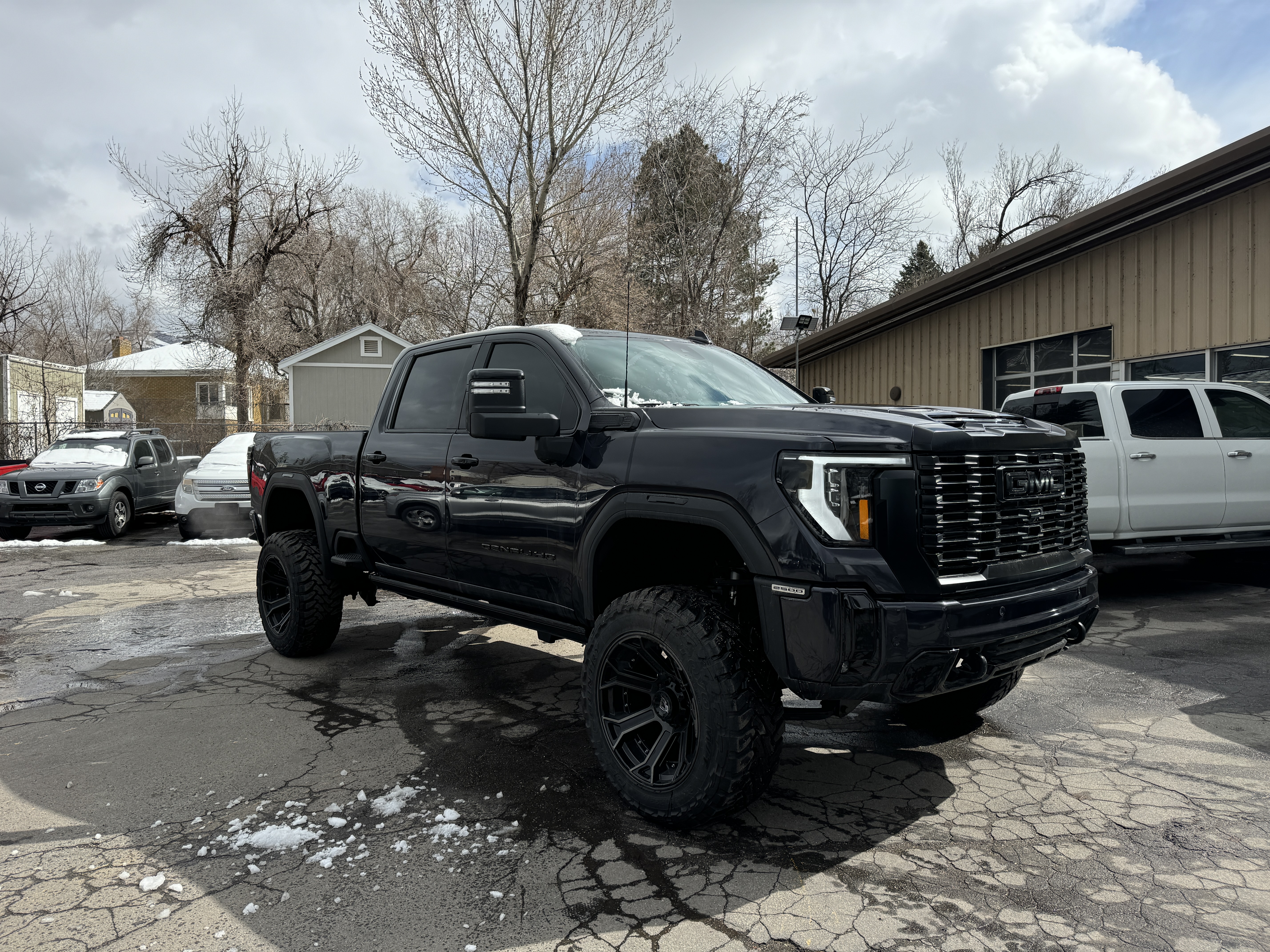 Front bumper, hood, and fender refinished after repair
