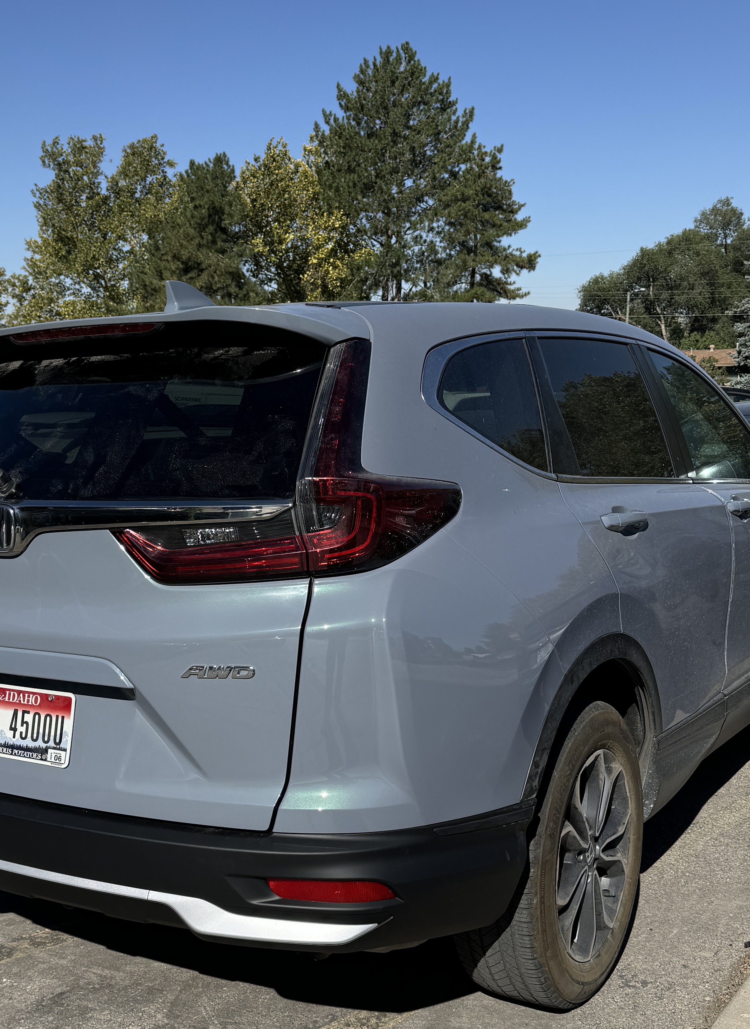 Rear bumper and quarter panel refinished and aligned after repair